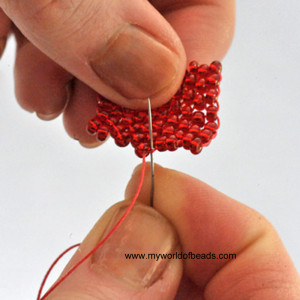 Knotting between beads, step 1