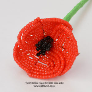 French beaded poppy, made with basic French beading techniques